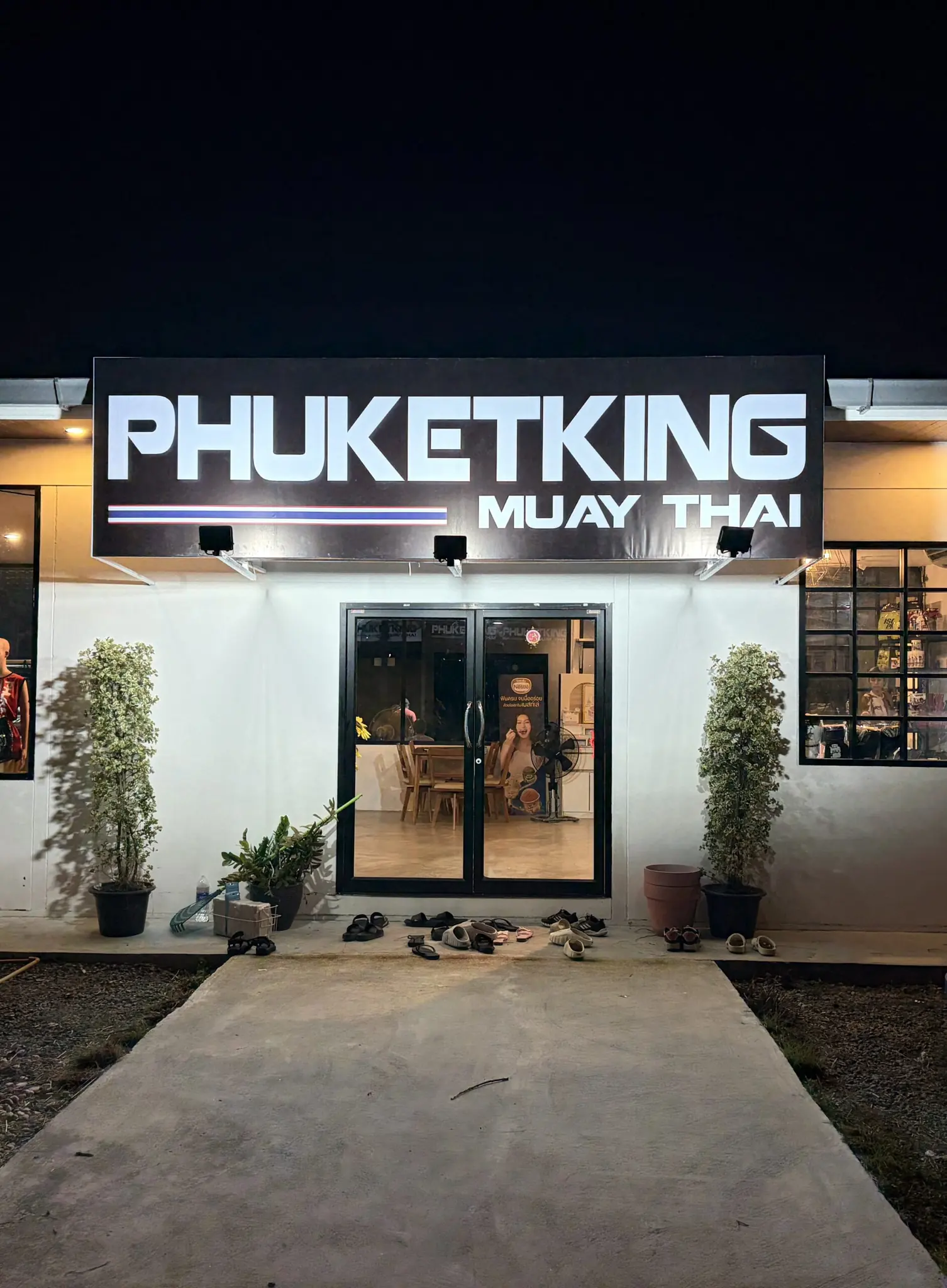 The front of Phuket King Muay Thai at night